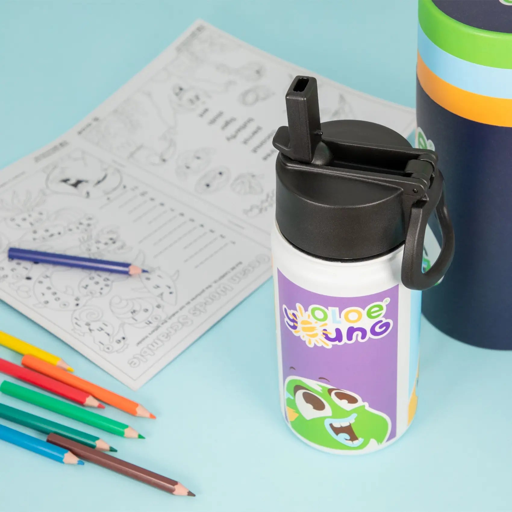 oloe-character-drink-bottle-black-product-lifestyle-shot-with-colouring-book-and-pencils